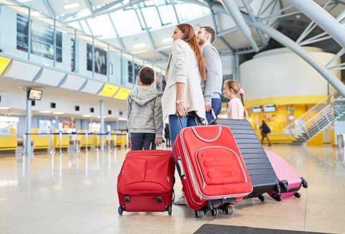 International courier service for luggage from Kochi with packed suitcases ready for overseas shipping